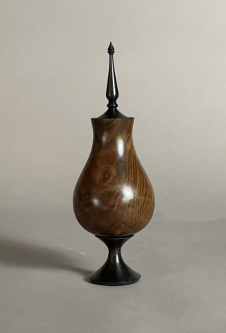 Footed walnut vase with finial 4" wide x 11 1/2" tall